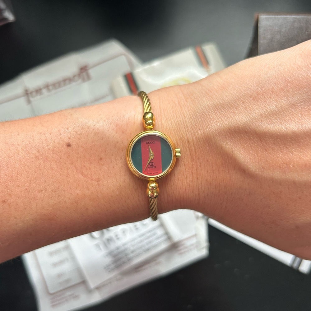 Gucci 6 1/2” mother of pearl lovely authentic ladies gold bangle watch